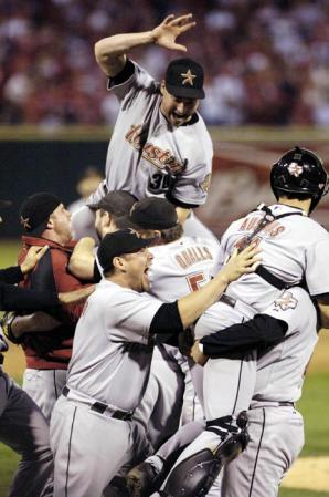 The Houston Astros celebrate after the final out of game six of the National League Championship Series against the St. Louis Cardinals at Busch Stadium in St. Louis Missouri Wednesday 19 October 2005.