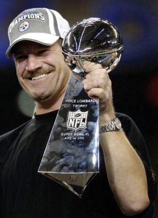 Pittsburgh Steelers head coach Bill Cowher holds the Vince Lombardi Trophy after the Steelers defeated the Seattle Seahawks 21-10 in Super Bowl XL at Ford Field in Detroit, Michigan Sunday, 05 February 2006.