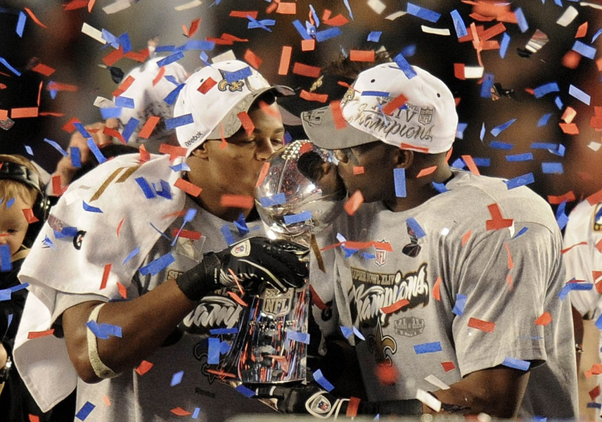 New Orleans Saints players kiss the Vince Lombardi trophy after the Saints defeated the Colts 31-17 in Super Bowl XLIV at Sun Life Stadium in Miami, Florida, USA, 07 February 2010.