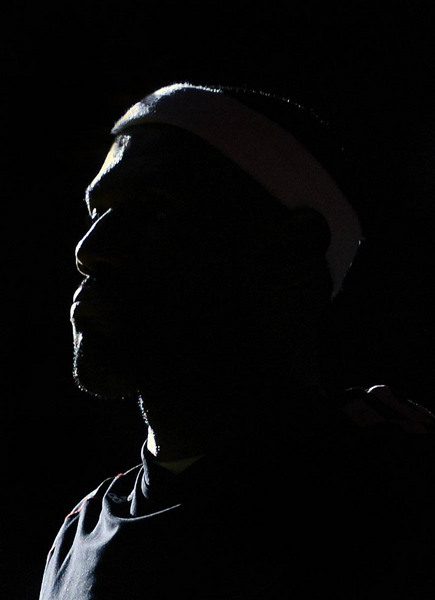 Miami Heat's LeBron James stands during pregame ceremonies before the NBA basketball game against the Oklahoma City Thunder in Miami, Florida, April 4, 2012