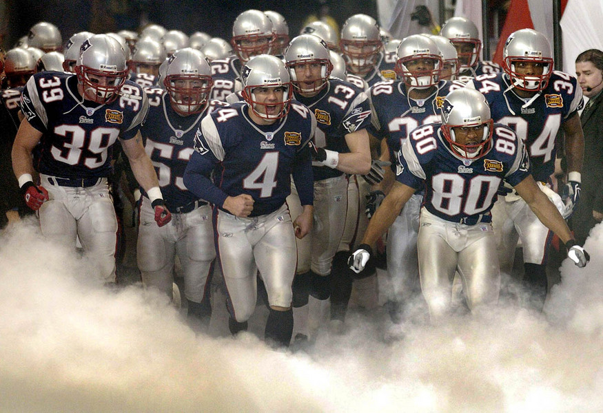 The New England Patriots arrive on the field after the pre-game show at Super Bowl XXXVIII in Houston, Texas Sunday 01 February 2004