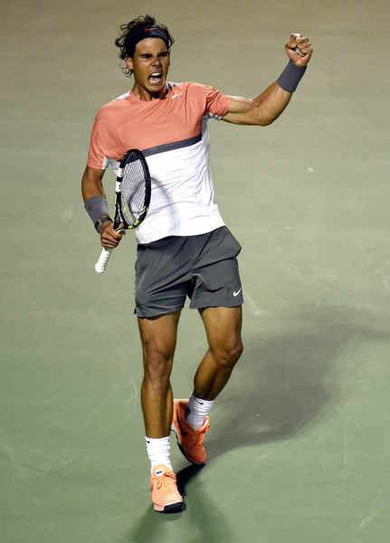 Rafael Nadal of Spain celebrates after defeating Milos Raonic of Canada following their quarter final match at the Sony Open tennis tournament on Key Biscayne in Miami