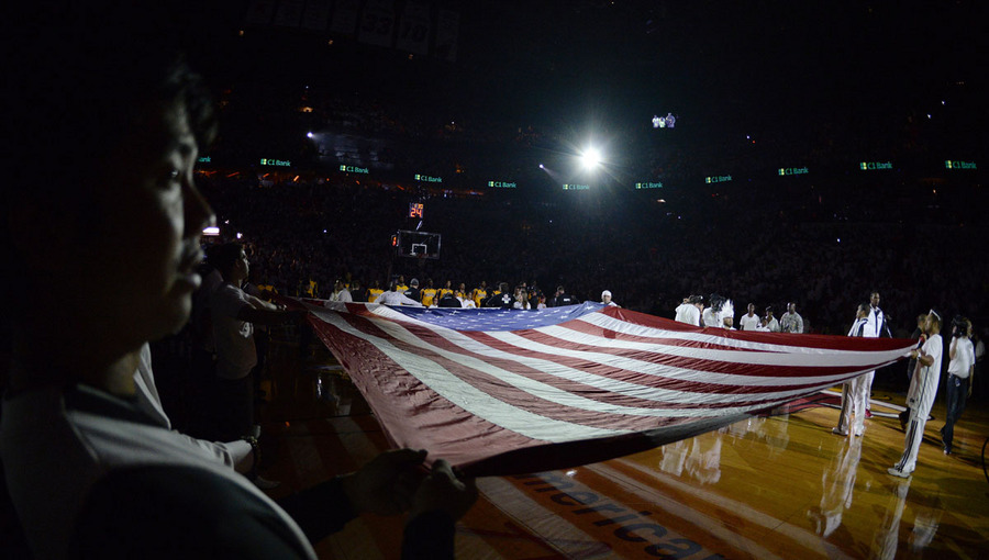  A large US national flag is held on the court before the start of the NBA Eastern Conference Finals playoff game 4 between the Indiana Pacers and the Miama Heat at the American Airlines Arena in Miami