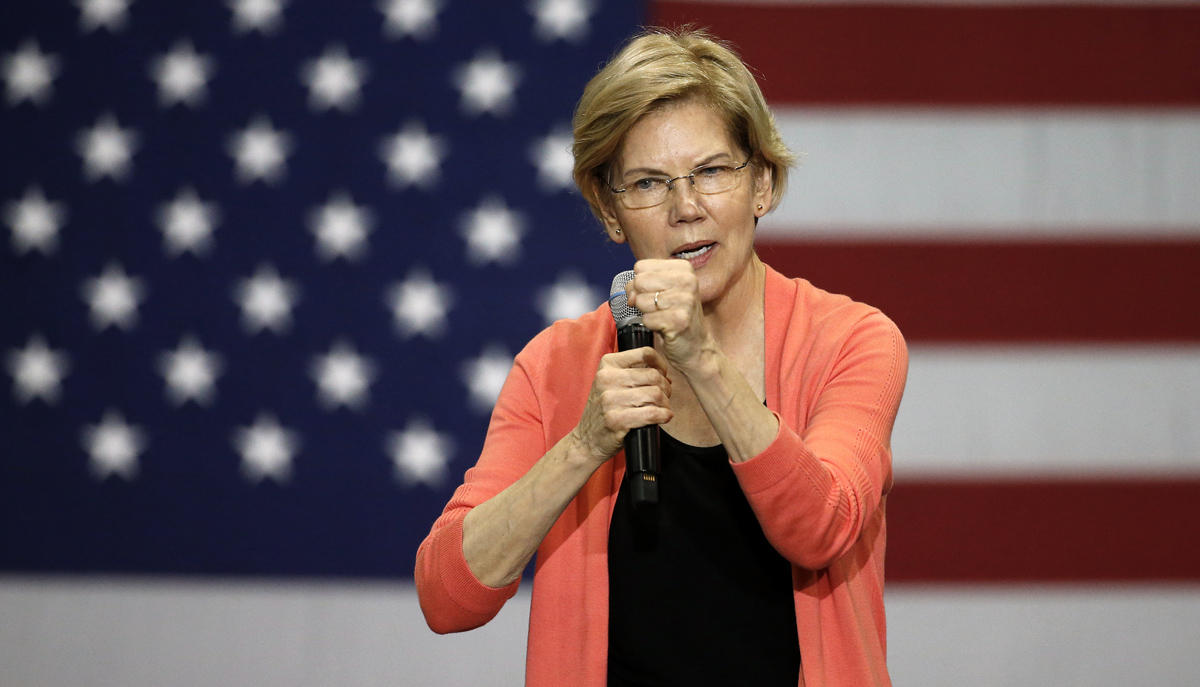 Senator of Massachusetts (D) and Democratic Presidential hopeful Elizabeth Warren gestures as she speaks during a town hall meeting at Florida International University in Miami, Florida on June 25, 2019.