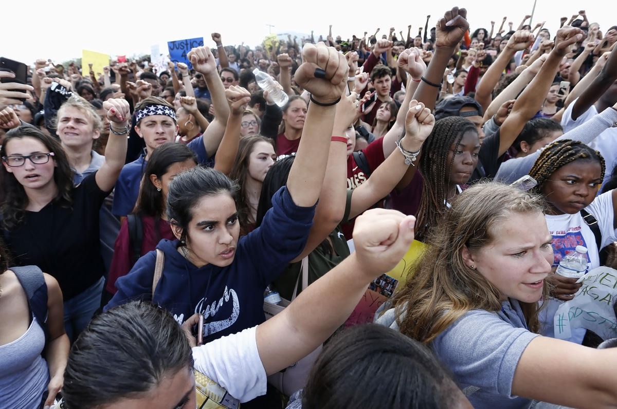Students of area High Schools rally at Marjory Stoneman Douglas High School after participating in a county wide school walk out in Parkland, Florida on February 21, 2018. 