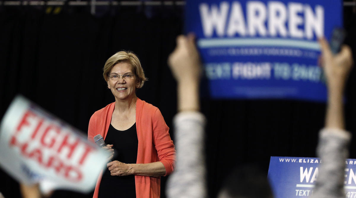 Senator of Massachusetts (D) and Democratic Presidential hopeful Elizabeth Warren gestures as she speaks during a town hall meeting at Florida International University in Miami, Florida on June 25, 2019.