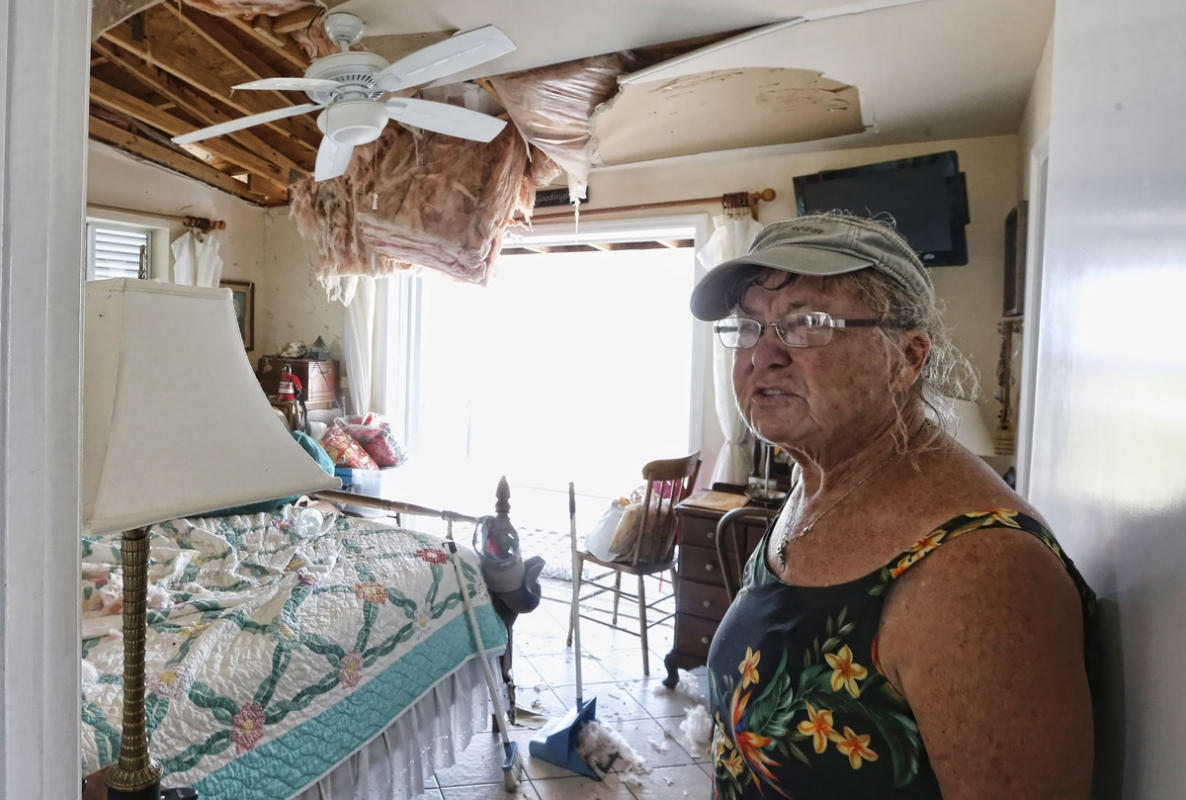 Big Pine Key resident, Penelope Kausal, talks about the damage to one of her bedrooms after Hurricane Irma struck the Florida Keys in Big Pine Key, Florida, USA, 20 September 2017.