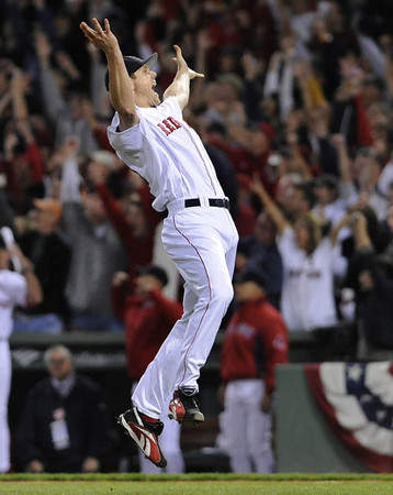 Boston Red Sox pitcher Jonathan Papelbon celebrates after the Red Sox defeated the Cleveland Indians 11-2 in game seven of the American League Championship Series at Fenway Park in Boston Massachusetts.
