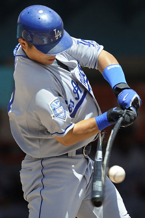 Los Angeles Dodgers Chin-lung Hu of Taiwan breaks his bat against the Florida Marlins during their game at Dolphin Stadium in Miami, Florida 01 May 2008.