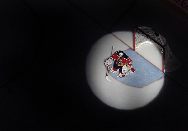 Florida Panthers goalie Ed Belfour stands for team introductions prior to the start of their game against the Buffalo Sabres at the Bank Atlantic Center in Sunrise, Florida.