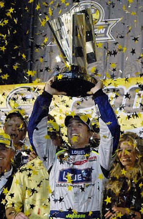  Nextel Cup winner Jimmie Johnson celebrates his back to back Nextel Cup championship in victory lane following the Ford 400 NASCAR race at the Homestead Miami Speedway in Homestead, Florid
