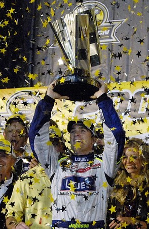  Nextel Cup winner Jimmie Johnson celebrates his back to back Nextel Cup championship in victory lane following the Ford 400 NASCAR race at the Homestead Miami Speedway in Homestead, Florid