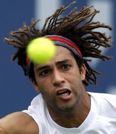 James Blake of the US keeps his eye on the ball against Sargis Sargsian of Armenia during their match at the US Open in Flushing Meadows, New York.