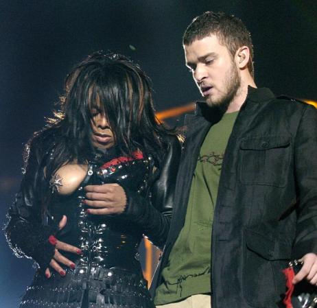 Singer Janet Jackson's right breast is exposed as singer Justin Timberlake (R) watches at the end of the halftime show at Super Bowl XXXVIII in Houston, Texas.