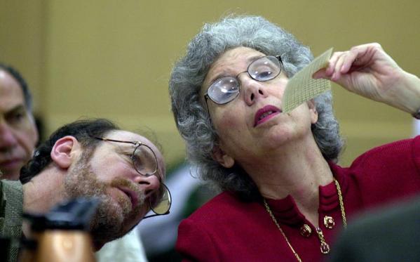 Broward County Canvassing Board Member Suzanne Gunzburger shows a ballot to an unidentified observer 23 November 2000 at the Broward County Courthouse in Ft. Lauderdale, Florida. 