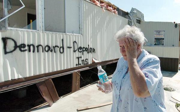 Hellen Gibson reacts as she talks about her husband's death five weeks prior to her home being destroyed by Hurricane Charley in Punta Gorda, Florida, Sunday 15 August 2004