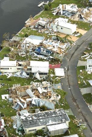 Neighbourhoods were destroyed by Hurricane Charley shown in this aerial view in Punta Gorda, Florida Monday 16 August 2004. Charley, a category 4 hurricane with sustained winds of 145 miles per hour swept through the west coast of Florida 13 August leaving millions of dollars in damage in it's wake